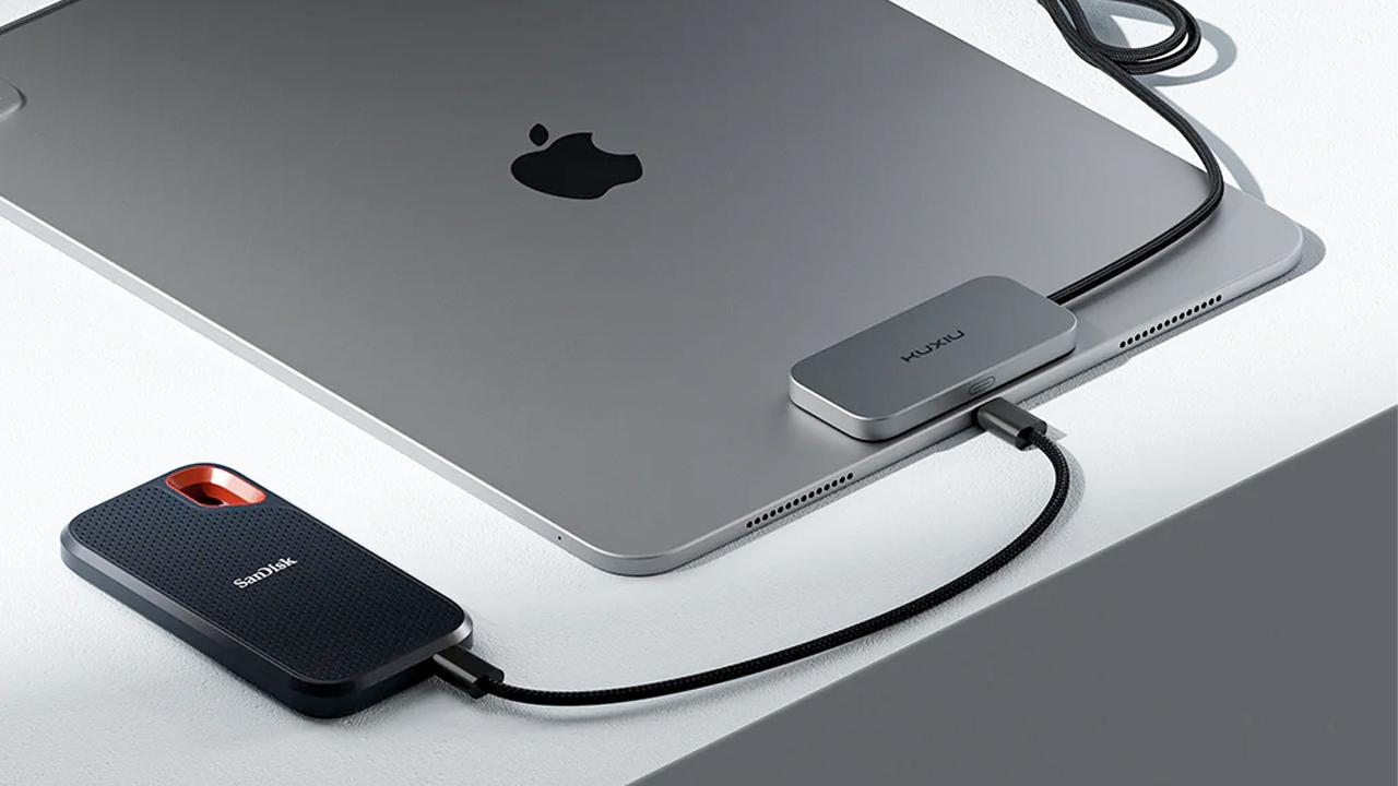 Kuxiu представила беспроводную зарядку для iPad с подключением через Smart Connector